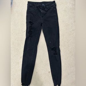 Black skinny ripped denim jeans